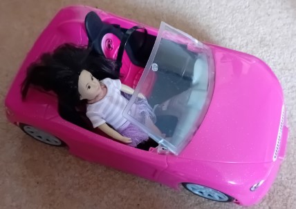 Pink car and doll